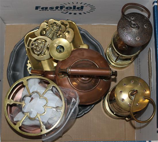 Two miners lamps, horse brasses and other metal ware